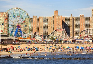 New York, NY, USA - August 30, 2016: Beach in Coney Island: People enjoy beach: Coney Island is a peninsular residential neighborhood, beach, and leisure/entertainment.; Shutterstock ID 484899217; Purchase Order: wabc